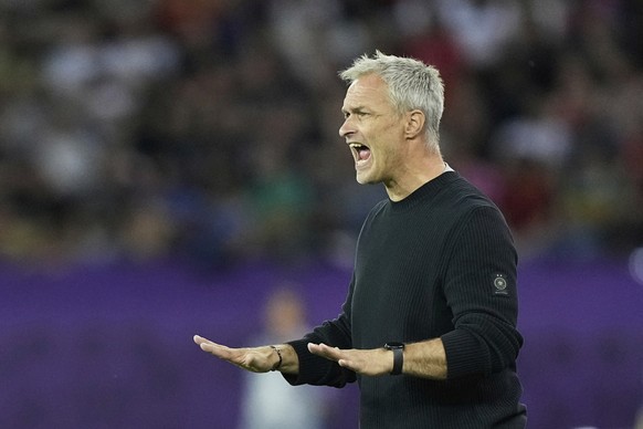 Germany head coach Christian Wueck shouts during the Women&#039;s Euro 2025 semifinals soccer match between Germany and Spain at Stadion Letzigrund in Zurich, Switzerland, Wednesday, July 23, 2025. (A ...