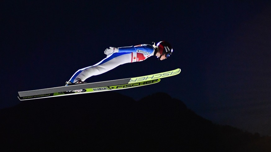 epa09046858 Maren Lundby of Norway in action during a qualification jump for the women?s large hill individual competition at the 2021 FIS Nordic Skiing World Championships in Oberstdorf, Germany, 02  ...