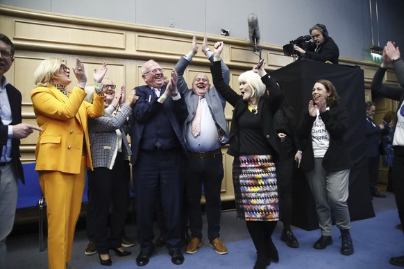 &#039;No&#039; campaigners celebrate at Dublin Castle as the result is announced in the first of the twin referendums to change the Constitution on family and care, in Dublin, Saturday March 9, 2024.  ...