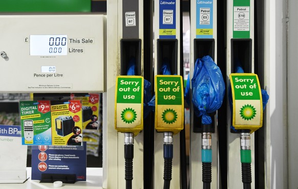 epa09492661 A closed down petrol station is pictured in central London, Britain 28 September 2021. Drivers' 'panic-buying' last weekend has forced many stations to close due to a shorta ...