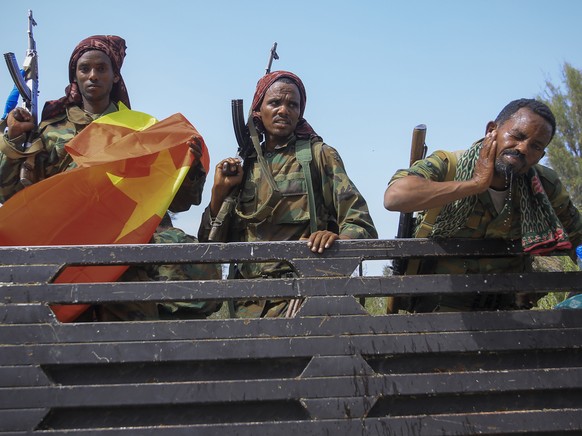 FILE - In this Tuesday, June 29, 2021 file photo, Tigray forces ride in a truck after taking control of Mekele, in the Tigray region of northern Ethiopia. The leader of the Oromo Liberation Army armed ...
