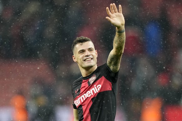 Leverkusen&#039;s Granit Xhaka waves to supporters after during the German Bundesliga soccer match between Bayer Leverkusen and Borussia Dortmund at the BayArena in Leverkusen, Germany, Sunday, Dec. 3 ...
