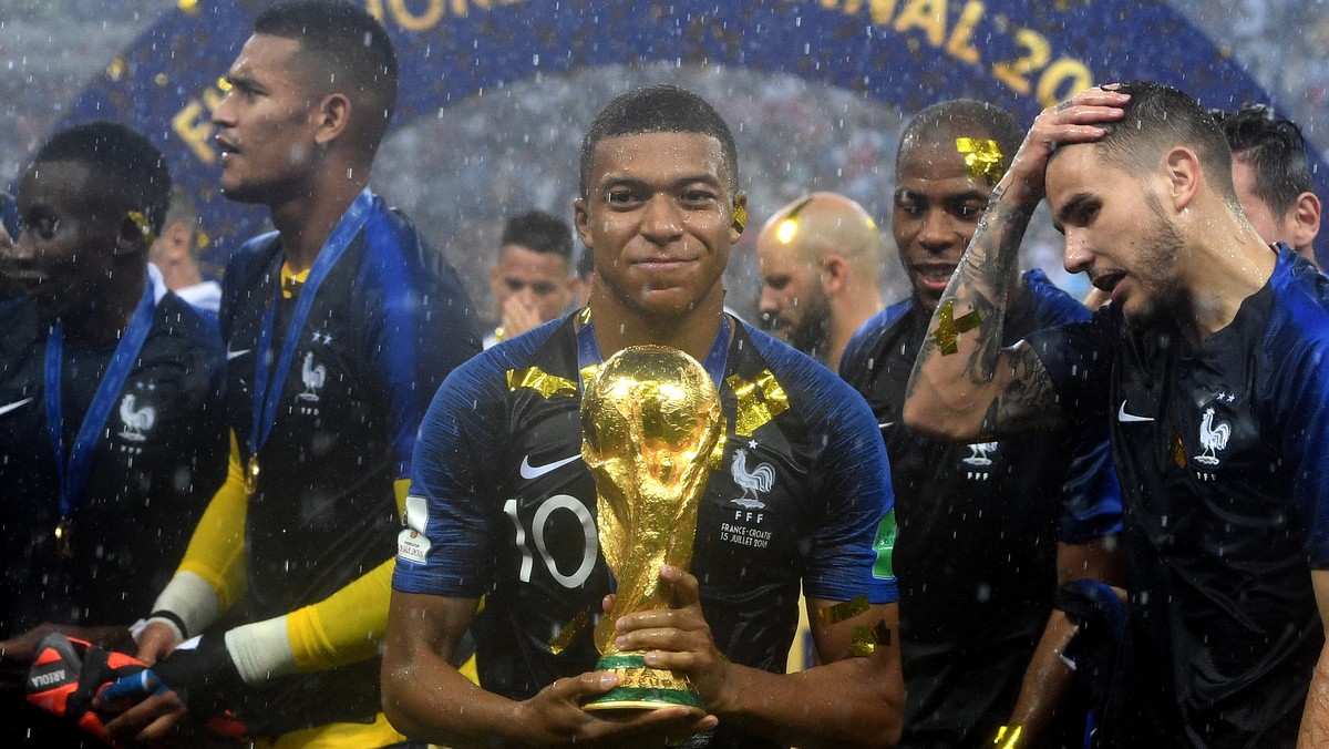 epaselect epa06891526 Kylian Mbappe of France reacts with the trophy after winning the FIFA World Cup 2018 final between France and Croatia in Moscow, Russia, 15 July 2018.

(RESTRICTIONS APPLY: Edi ...