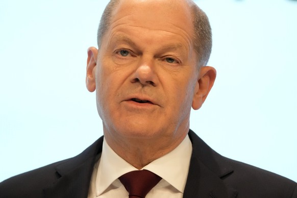 Social Democratic Party, SPD, chancellor candidate Olaf Scholz speaks at a joint news conference in Berlin, Germany, Wednesday, Nov. 24, 2021. After weeks of negotiations the leaders of the three part ...