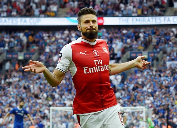 epa05994283 Arsenal Olivier Giroud celebrates after assisting Aaron Ramsey&#039;s score against Chelsea during the FA Cup final match Arsenal vs Chelsea at Wembley Stadium in London, Britain, 27 May 2 ...
