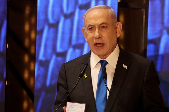 epa11336583 Israeli Prime Minister Benjamin Netanyahu addresses a ceremony marking Memorial Day for fallen soldiers of IsraelÄôs wars and victims of attacks at Israel&#039;s Mount Herzl national mili ...