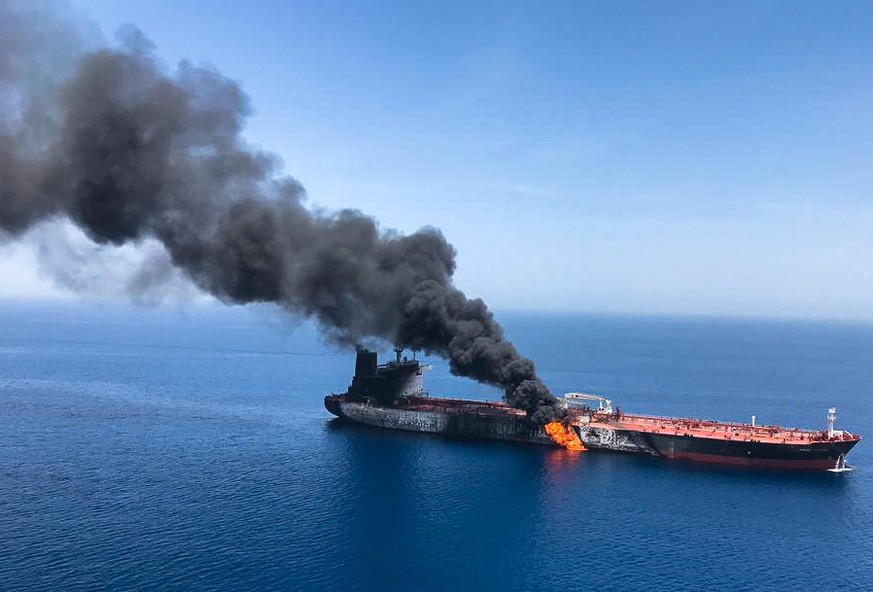 epa07645392 The crude oil tanker Front Altair on fire in the Gulf of Oman, 13 June 2019. According to the Norwegian Maritime Authority, the Front Altair is currently on fire in the Gulf of Oman after  ...