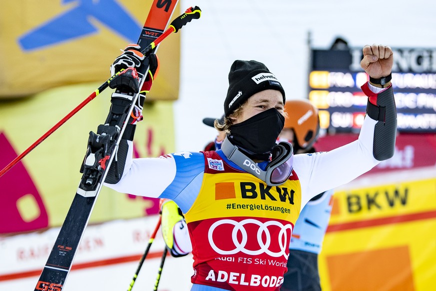 Third placed Marco Odermatt of Switzerland celebrates in the finish area after the second run of the men&#039;s giant slalom race at the Alpine Skiing FIS Ski World Cup in Adelboden, Switzerland, Frid ...