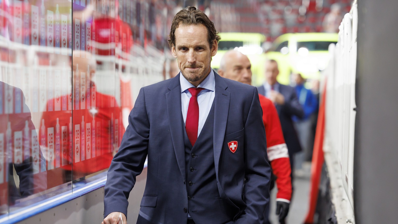 Patrick Fischer, head coach of Switzerland national ice hockey team, smiles, during the IIHF 2023 World Championship preliminary round group B game between Norway and Switzerland, at the Riga Arena, i ...