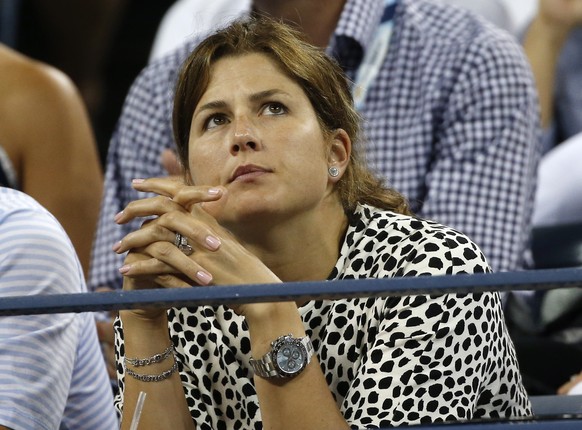 Mirka Federer watches her husband Roger Federer, of Switzerland, compete against Marcel Granollers, of Spain, during the third round of the 2014 U.S. Open tennis tournament, Sunday, Aug. 31, 2014, in  ...