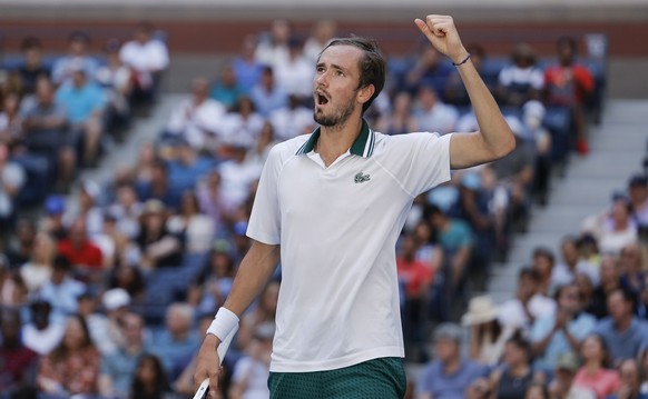 epa09454157 Daniil Medvedev of Russia reacts to winning a point on his way to defeating Botic van de Zandschulp of the Netherlands in their quarterfinal match on the ninth day of the US Open Tennis Ch ...