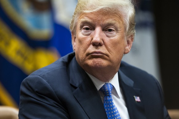 epa06966938 US President Donald J. Trump speaks with lawmakers during a roundtable discussion on the Foreign Investment Risk Review Modernization Act in the Roosevelt Room of the White House in Washin ...