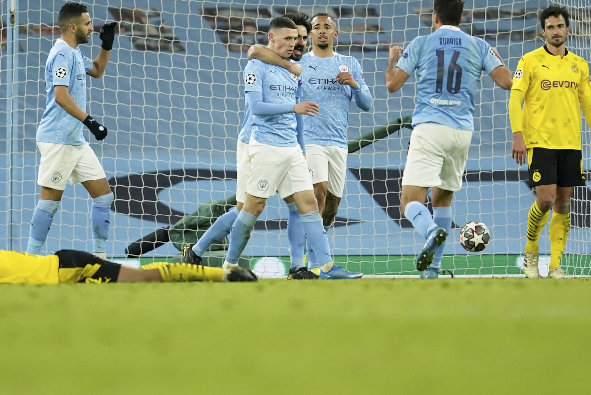 Manchester City's Phil Foden celebrates after scoring his side's second goal during the Champions League, first leg, quarterfinal soccer match between Manchester City and Borussia Dortmund a ...