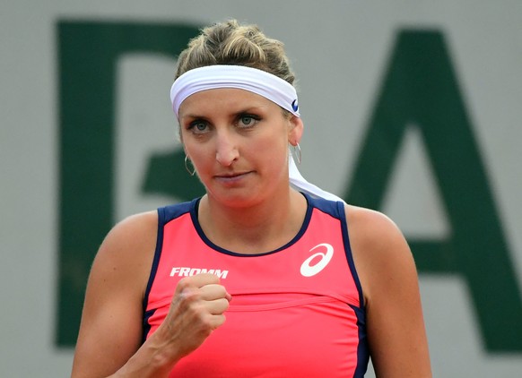 epa06006611 Timea Bacsinszky of Switzerland reacts as she plays against Ons Jabeur of Tunisia during their womenâs single 3nd round match during the French Open tennis tournament at Roland Garros in ...