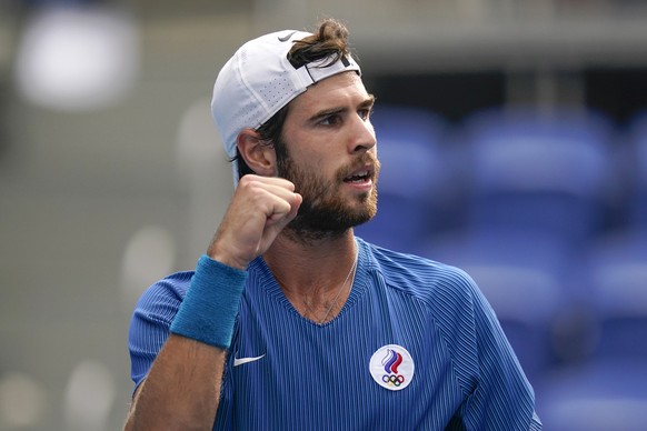 Karen Khachanov, of the Russian Olympic Committee, gestures during a semifinal men&#039;s tennis match against Pablo Carreno Busta, of Spain, at the 2020 Summer Olympics, Friday, July 30, 2021, in Tok ...