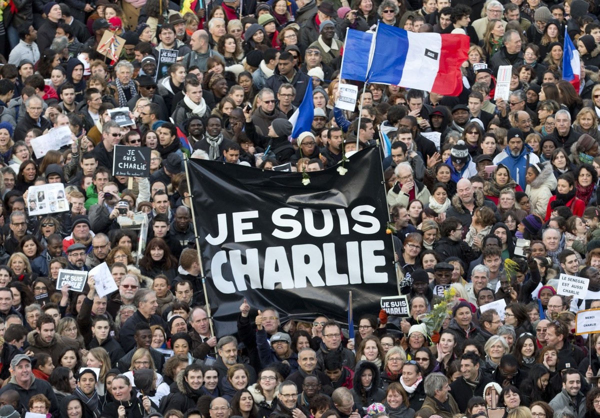 Thousands of people gather at Republique square in Paris, France, Sunday, Jan. 11, 2015. Thousands of people began filling France's iconic Republique plaza, and world leaders converged on Paris i ...