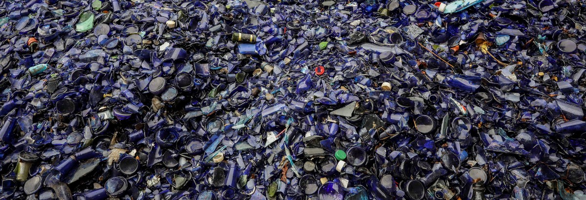 epa07786020 Close-up view of glass bottles in the recycling company MultiRecicla's sorting plant in the town of Mampote, Venezuela, 15 August 2019 (Issued on 22 August 2019). The 'Protect Pa ...
