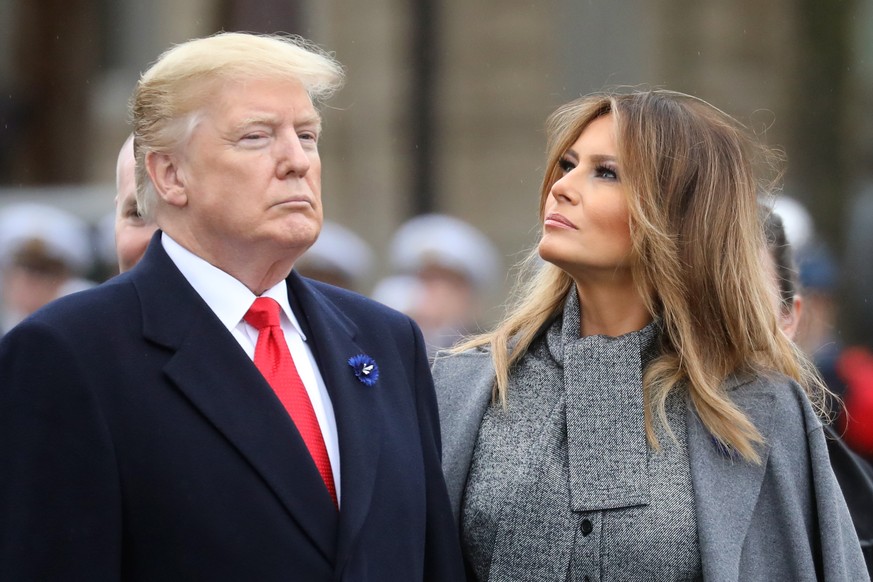 epa07157928 US President Donald J. Trump (L) and his wife US First Lady Melania Trump prepare to leave after they attended a ceremony at the Arc de Triomphe in Paris, France, 11 November 2018 as part  ...