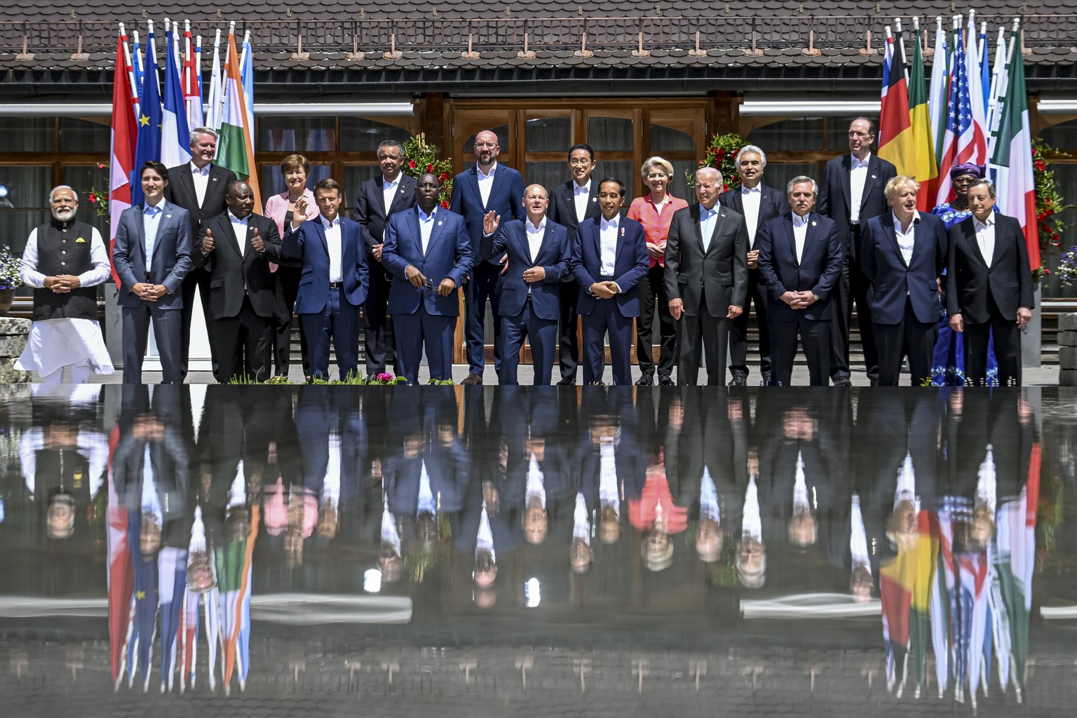 epa10036408 G7-leaders and participants of the outreach program pose for a family photo at Elmau Castle in Kruen, Germany, 27 June 2022. Germany is hosting the G7 summit at Elmau Castle near Garmisch- ...