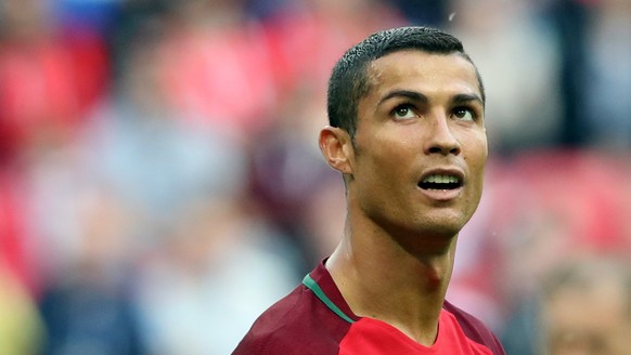 epa06035579 Cristiano Ronaldo of Portugal reacts during the FIFA Confederations Cup 2017 group A soccer match between Portugal and Mexico at the Kazan Arena in Kazan, Russia, 18 June 2017. EPA/TOLGA B ...