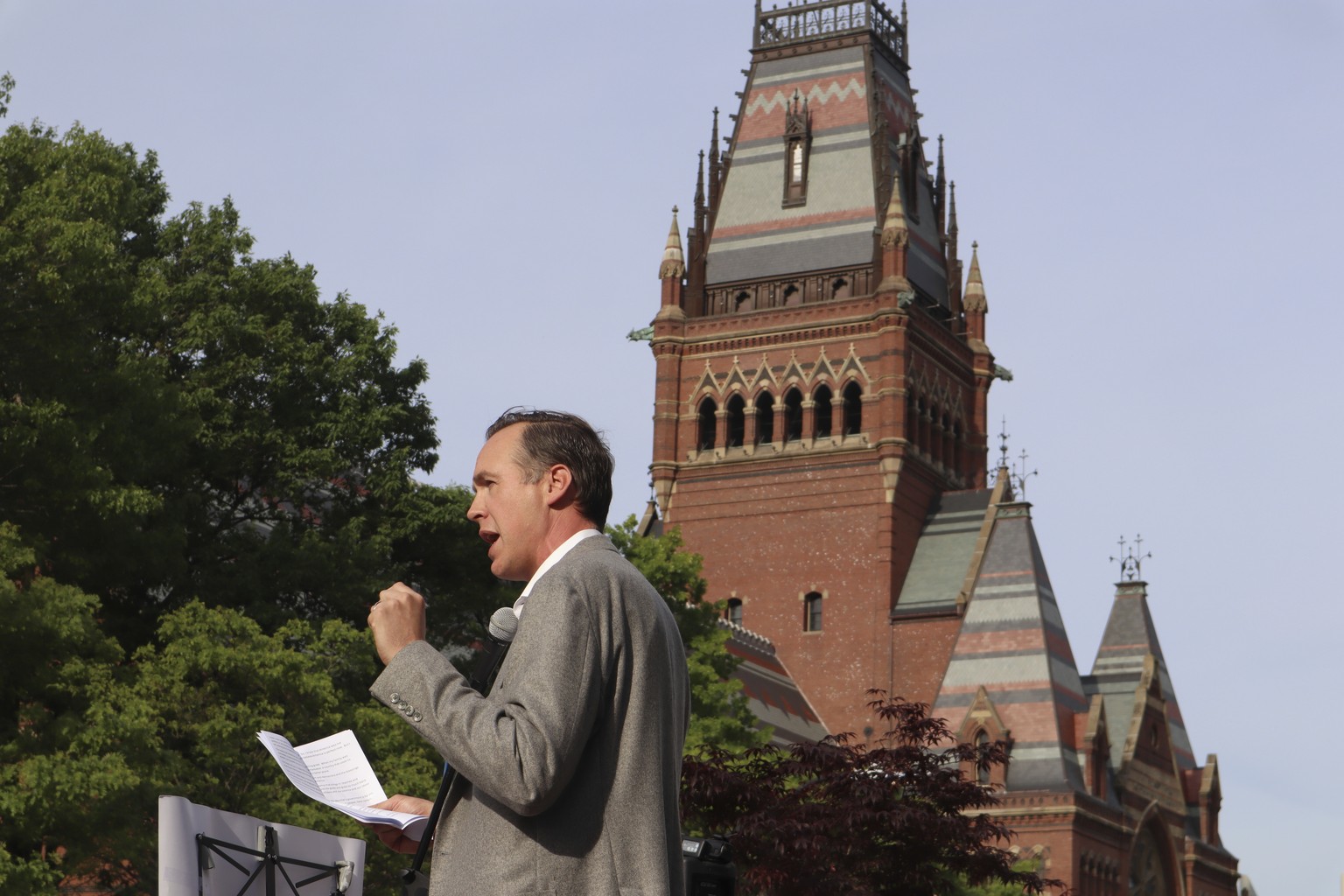 Ryan Enos, a government professor at Harvard University, speaks at a protest against President Donald Trump&#039;s recent sanctions against Harvard in front of Science Center Plaza on Tuesday, May 27, ...