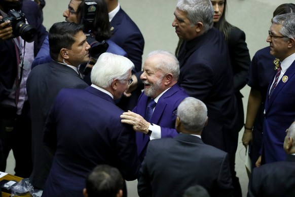 epa10385737 German President Frank-Walter Steinmeier (C-L) greets Brazil President Luiz Inacio Lula da Silva (C-R) following his inauguration ceremony in Brasilia, Brazil, 01 January 2023. Lula was sw ...