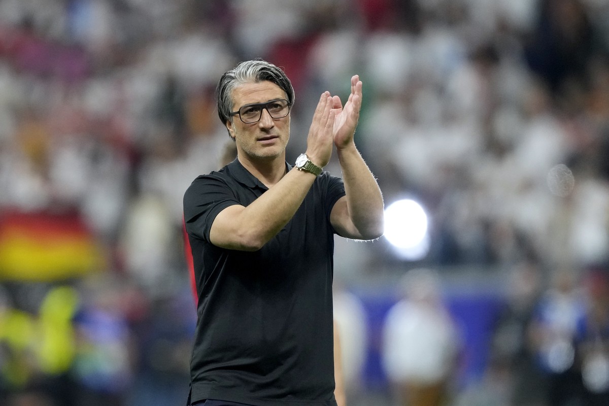 Switzerland's head coach Murat Yakin reacts after a Group A match between Switzerland and Germany at the Euro 2024 soccer tournament in Frankfurt, Germany, Sunday, June 23, 2024. (AP Photo/Martin ...