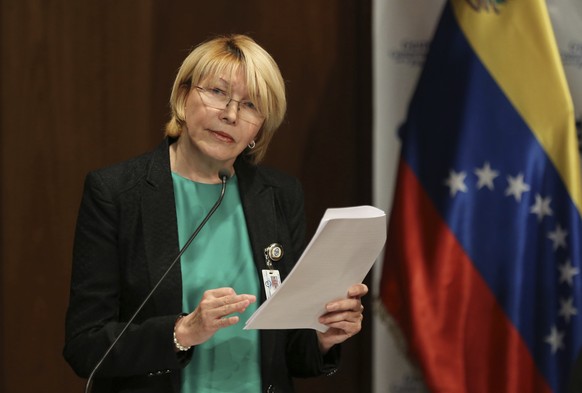 FILE - In this June 28, 2017 file photo, Venezuela's chief prosecutor Luisa Ortega speaks during a press conference in Caracas, Venezuela. The ousted chief prosecutor fled to Colombia with her hu ...