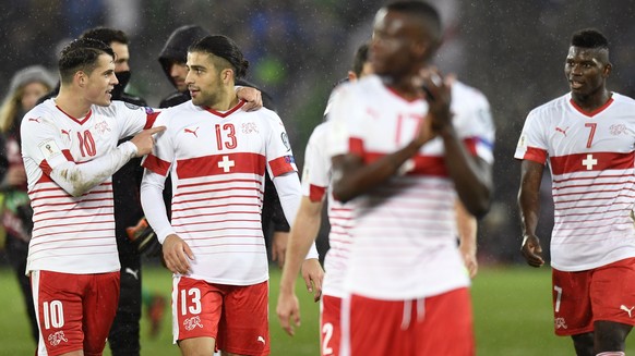 From left to right, Switzerland&#039;s midfielder Granit Xhaka, Switzerland&#039;s defender Ricardo Rodriguez, Switzerland&#039;s midfielder Denis Zakaria, Switzerland&#039;s forward Breel Embolo, cel ...