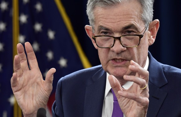 FILE - In this Wednesday, Sept. 26, 2018 file photo, Federal Reserve Chairman Jerome Powell speaks during a news conference in Washington. The strengthening U.S. economy is edging closer to achieving  ...