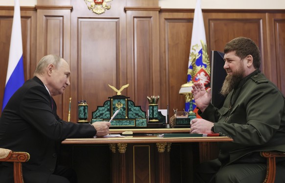 Russian President Vladimir Putin, left, meets with Chechnya&#039;s regional leader Ramzan Kadyrov at the Kremlin in Moscow, Russia, Thursday, Sept. 28, 2023. (Mikhail Metzel, Sputnik, Kremlin Pool Pho ...