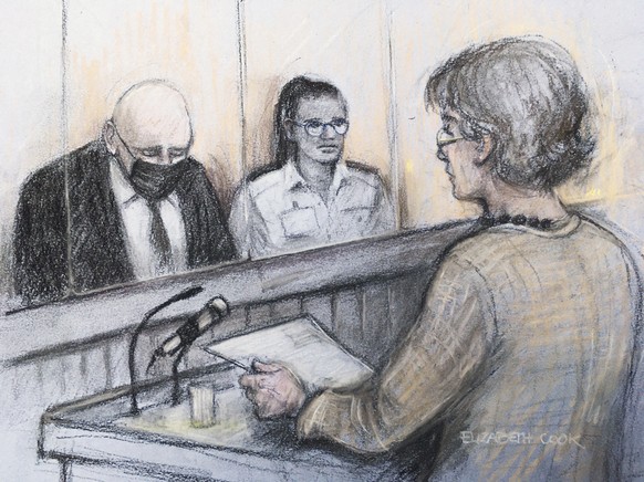 This court artist sketch provided on Wednesday, Sept. 29, 2021, Susan Everard, right, the mother of Sarah Everard, reading a victim impact statement as former Metropolitan Police officer Wayne Couzens ...