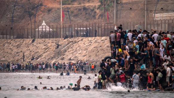 Migrants return to Morocco from the Spanish enclave of Ceuta, Friday, July 31, 2026. (AP Photo/Antonio Sempere)
Spain Ceuta