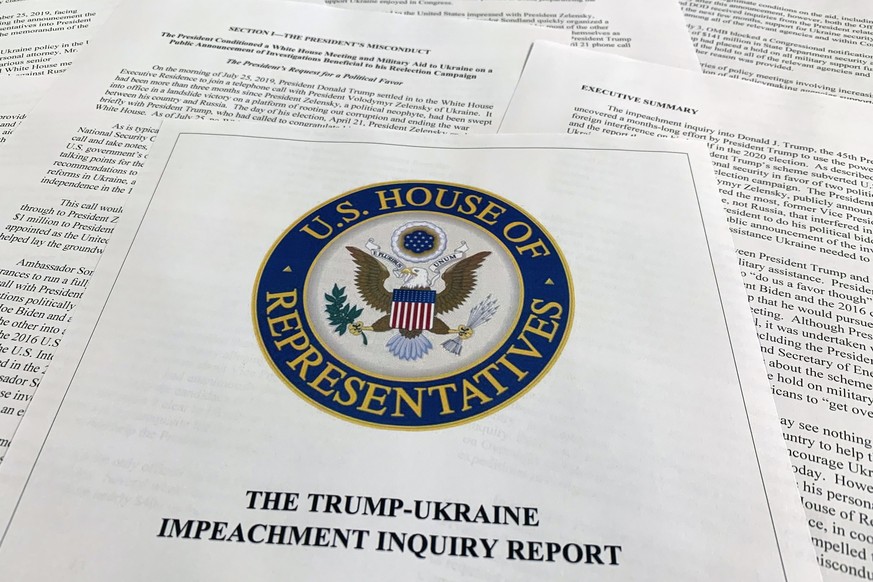 The report from Democrats on the House Intelligence Committee on the impeachment inquiry into President Donald Trump is photographed in Washington, Tuesday, Dec. 3, 2019. The House released a sweeping ...