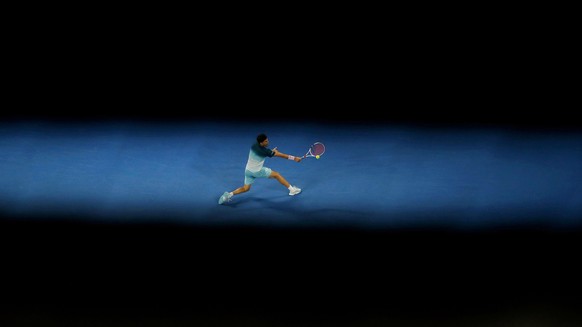 epaselect epa07292145 Dominic Thiem of Austria in action during his men&#039;s singles second round match against Alexei Popyrin of Australia at the Australian Open Grand Slam tennis tournament in Mel ...