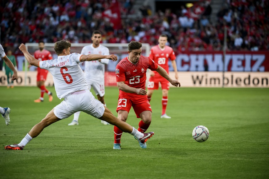 Spain&#039;s midfielder Marcos Llorente, left, fights for the ball with Switzerland&#039;s midfielder Xherdan Shaqiri, right, during the UEFA Nations League group A2 soccer match between Switzerland a ...