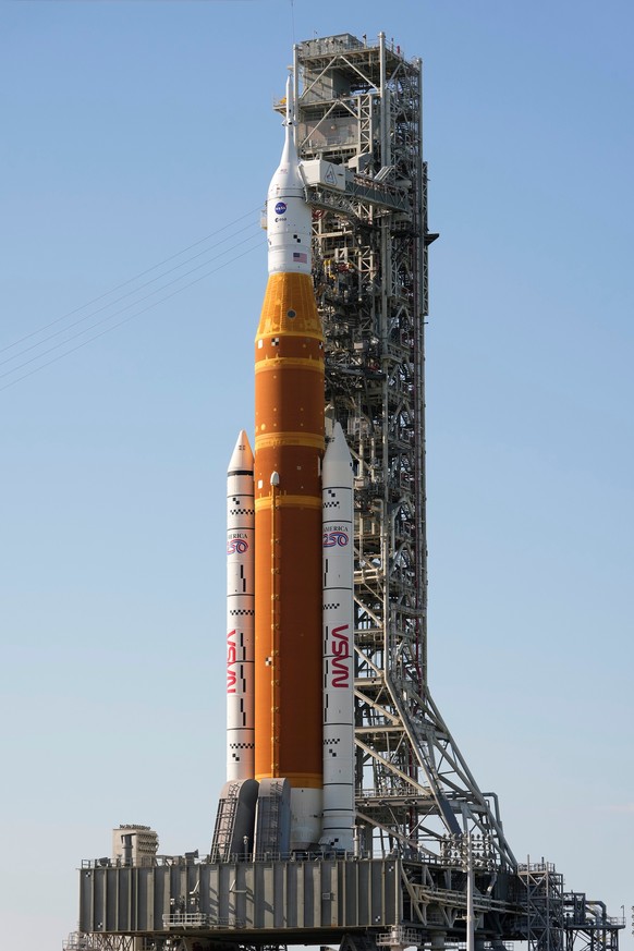 NASA's Artemis II SLS (Space Launch System) moon rocket with the Orion spacecraft sits on the launch pad at the Kennedy Space Center Friday, March 27, 2026, in Cape Canaveral, Fla. (AP Photo/Chri ...