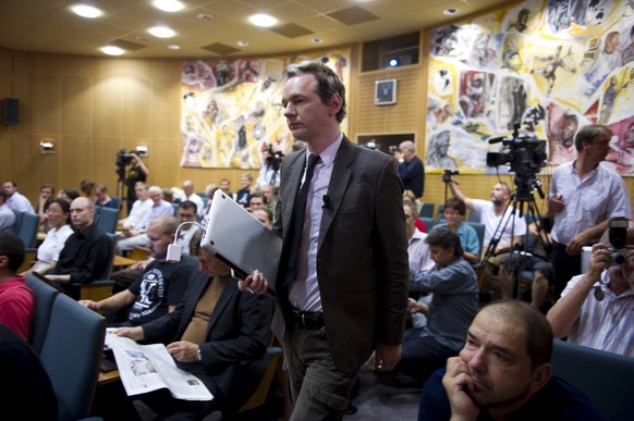 FILE - An Aug. 14, 2010 photo from files showing Wikileaks founder Julian Assange at a seminar held by the labour union in Stockholm. Swedish prosecutors say Assange will be interviewed on Nov. 14 at  ...