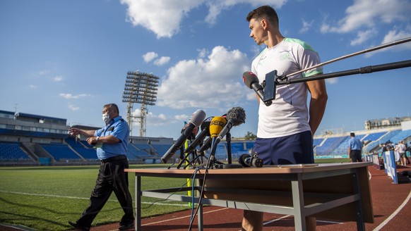 Switzerland&#039;s midfielder Christian Fassnacht, speaks to journalists after a training session for the UEFA Euro 2020 soccer tournament, at the Petrovsky stadium, in St. Petersburg, Russia, Wednesd ...