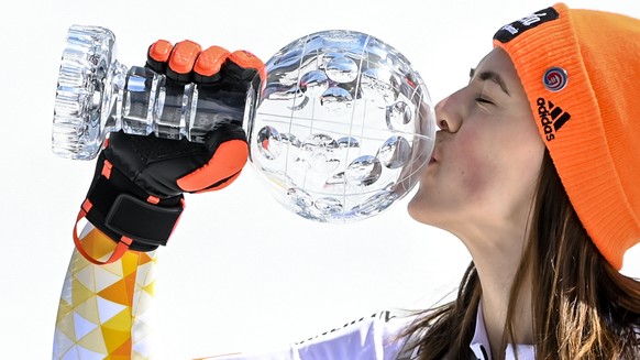 Petra Vlhova of Slovakia kisses the women&#039;s Slalom overall leader crystal globe trophy in the finish area during the second run of the women&#039;s Slalom race at the FIS Alpine Skiing World Cup  ...