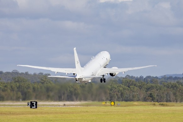 In this photo provided by the Australian Defense Force a Royal Australian Air Force P-8 Poseidon aircraft departs an airbase in Amberly, Australia, Monday, Jan. 17, 2022, to assist the Tonga governmen ...