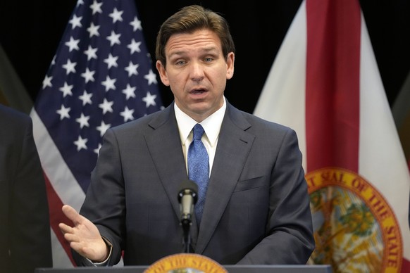 FILE - Florida Gov. Ron DeSantis speaks at a news conference at the Reedy Creek Administration Building Monday, April 17, 2023, in Lake Buena Vista, Fla. DeSantis has yet to enter the 2024 presidentia ...