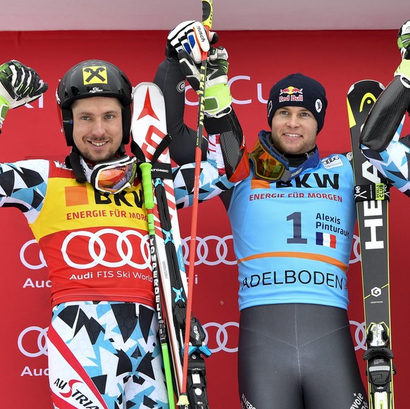 epa05703387 Winner France&#039;s Alexis Pinturault, center, celebrates with second placed Austria&#039;s Marcel Hirscher, left, and third placed Austria&#039;s Philipp Schoerghofer, right, during the  ...