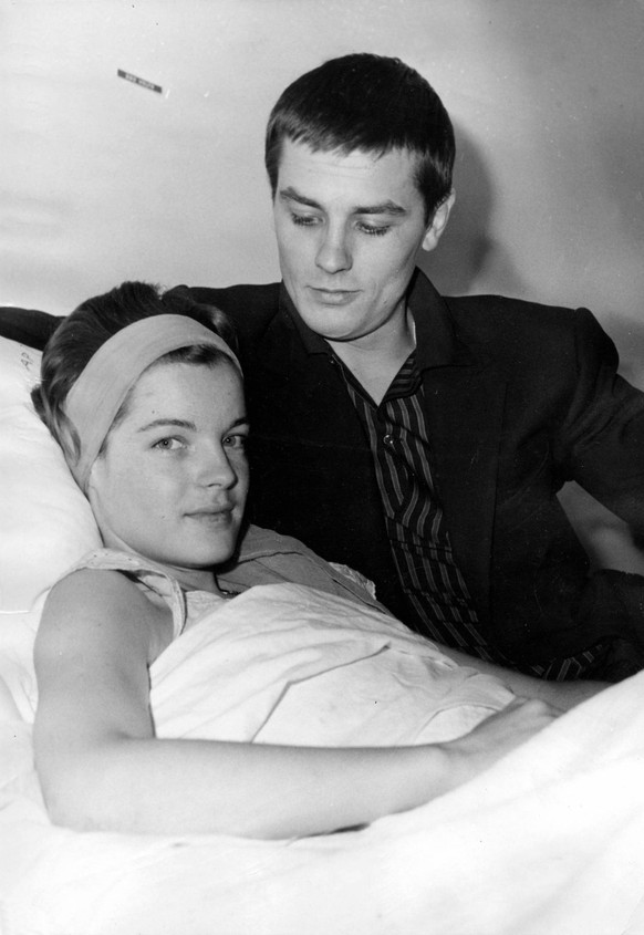 Mar. 15, 1961 - Neuilly-sur-Seine, France - ALAIN DELON visiting ROMY SCHNEIDER in Neuilly Clinic after her appendix operation. It was during the filming of Christine that ROMY SCHNEIDER fell in love  ...