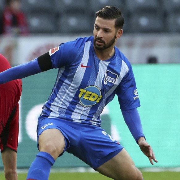 Hertha&#039;s Marvin Plattenhardt, right, and Freiburg&#039;s Janik Haberer challenge for the ball during a German Bundesliga soccer match between Herthas BSC Berlin and SC Freiburg in Berlin, eastern ...