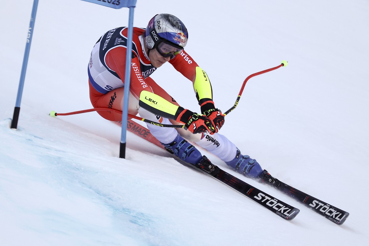 Switzerland's Marco Odermatt speeds down the course during the super G portion of an alpine ski, men's World Championship combined race, in Courchevel, France, Tuesday, Feb. 7, 2023. (AP Pho ...