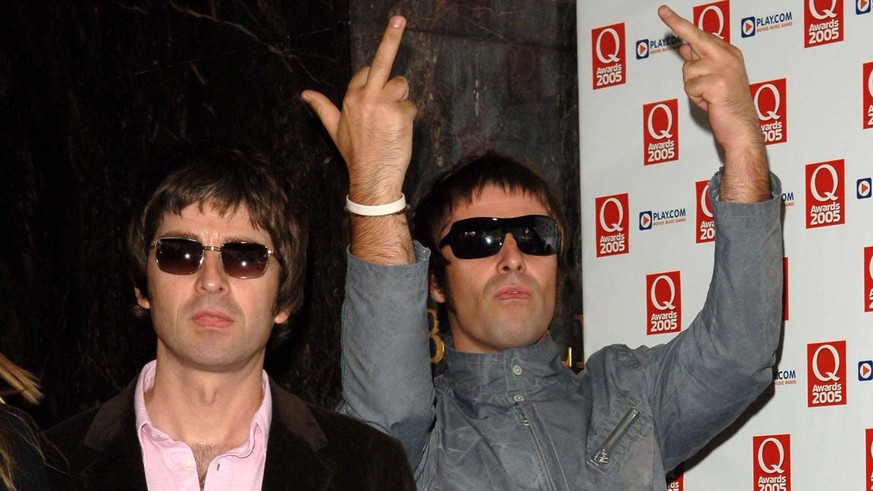 Q AWARDS 2005 Noel left and Liam Gallagher of Oasis arriving for the 2005 Q Awards at the Grosvenor House Hotel in London. Date:10.10.2005, Credit:Photoshot / Avalon United Kingdom, London PUBLICATION ...