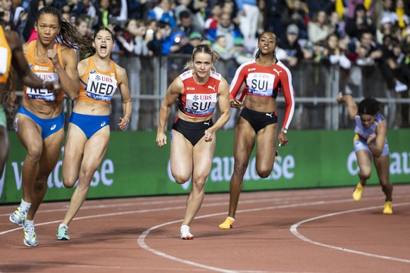 Sarah Atcho of Switzerland, right, passes the baton to Celine Buergi, as the Zoe Sedney, 2nd left, from the Netherlands, passes to Tasa Jiya in the 4x100m Relay Women during the World Athletics Diamon ...