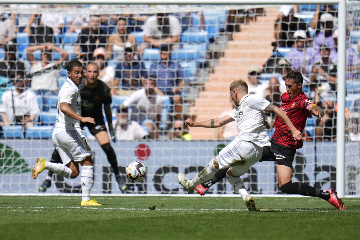 Real Madrid's Federico Valverde scores his side's first goal during the Spanish La Liga soccer match between Real Madrid and Mallorca at the Santiago Bernabeu stadium in Madrid, Spain, Sunda ...