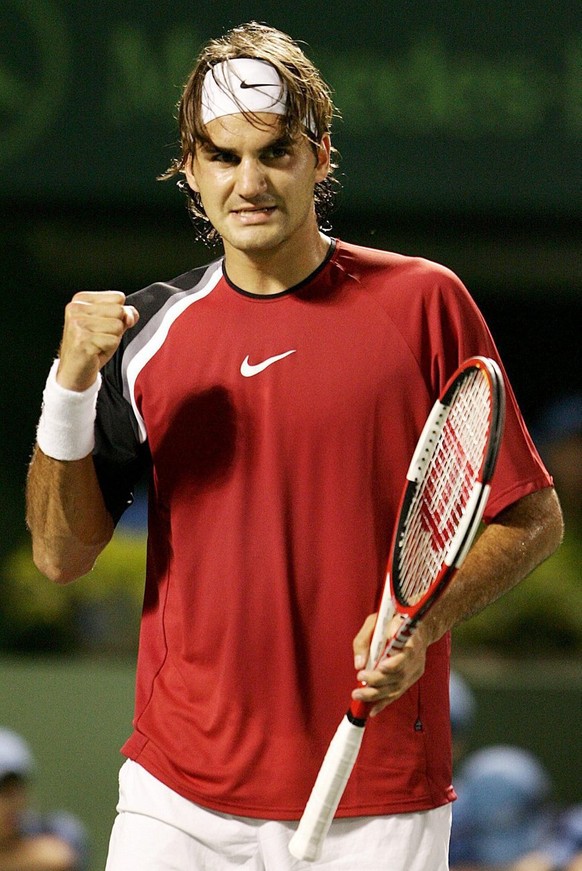 Roger Federer of Switzerland celebrates a point during his match against Andre Agassi of the USA during their semifinal match at the Nasdaq-100 Open in Key Biscayne, Florida Friday 01 April 2005. Fede ...